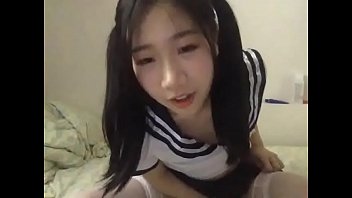 Young Chinese Asian student playing in adult free cam site